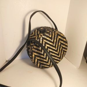 Lionel Circular Cross body Herringbone Handbag Leather strap Chevron